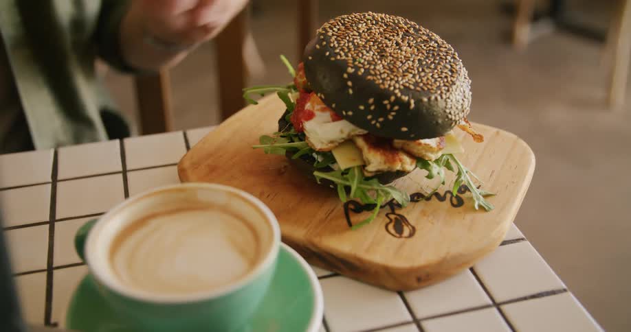 A person ordered a hamburger at a restaurant