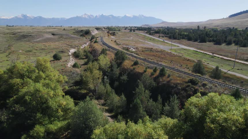 Cars are driving in a rural area in spring