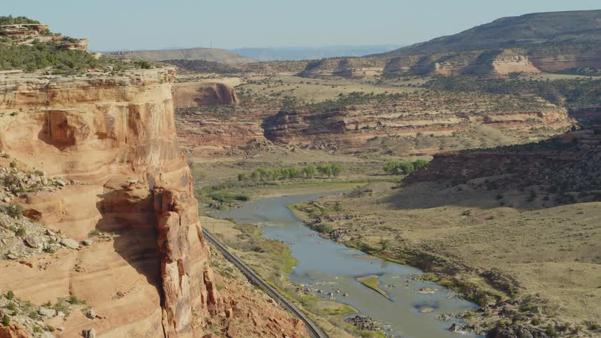 A small river runs through the canyon