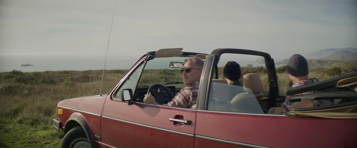 People in a car reversing