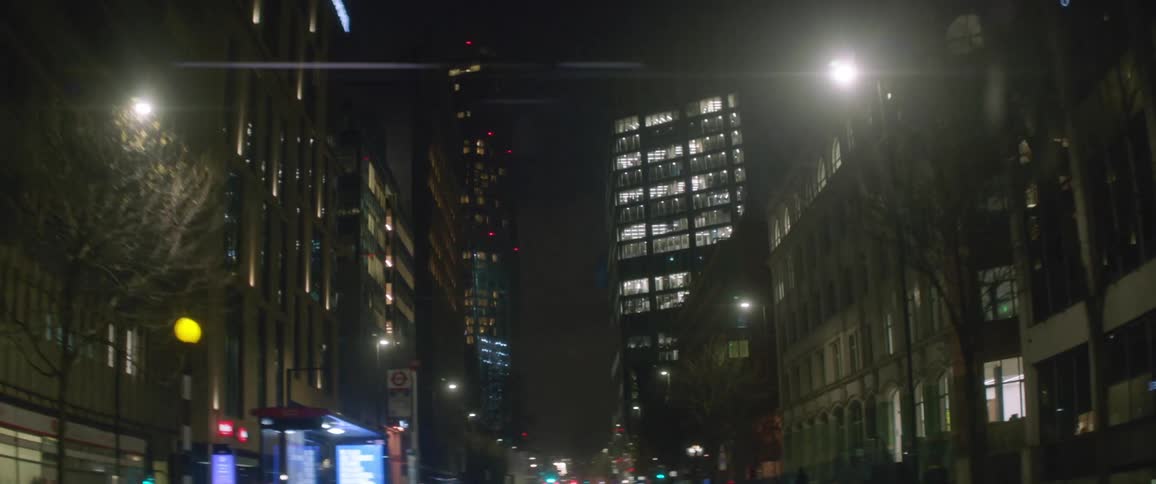 Traveling down a city street at night