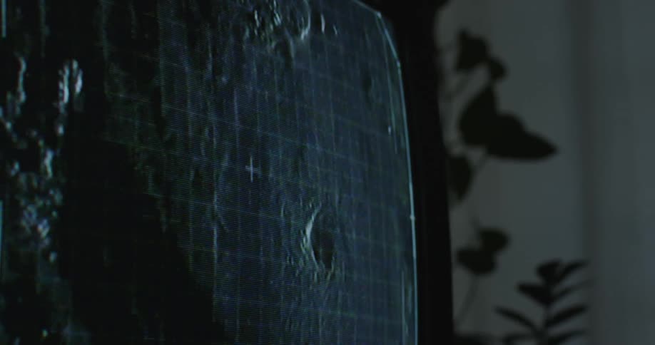 The eye of a hurricane shown on a television screen