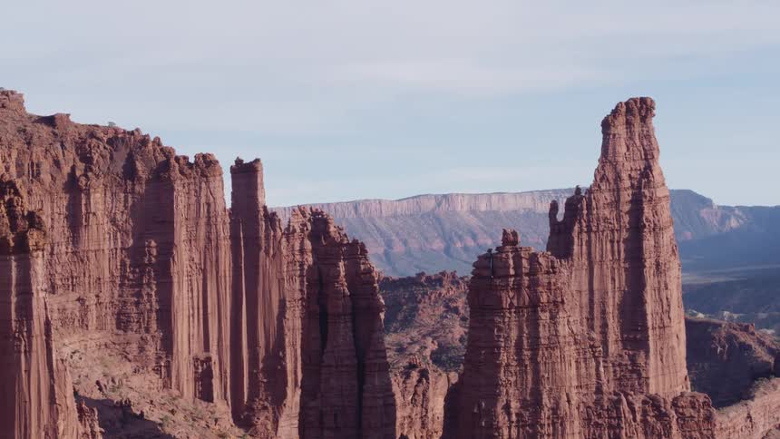 The tall rock formations cover the canyon