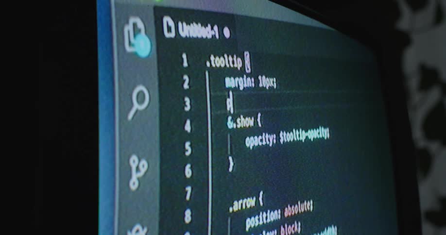 Computer code being written on a vintage display