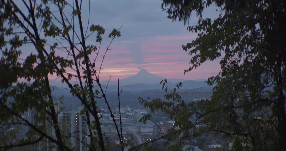 A time lapse of a sunset over a city
