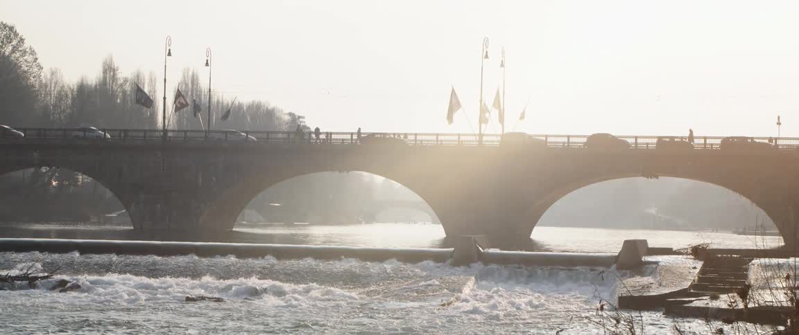 People walk across the bridge