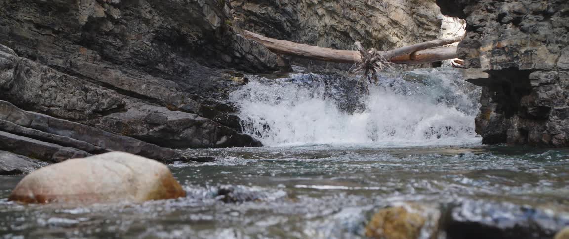 Waterfall flowing down a stream and over rocks