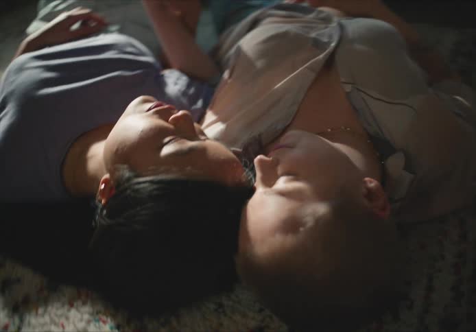 Females lying on ground together