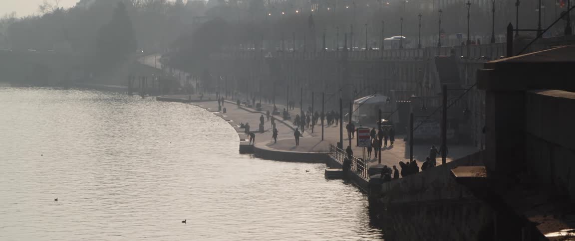 People walking at a pier