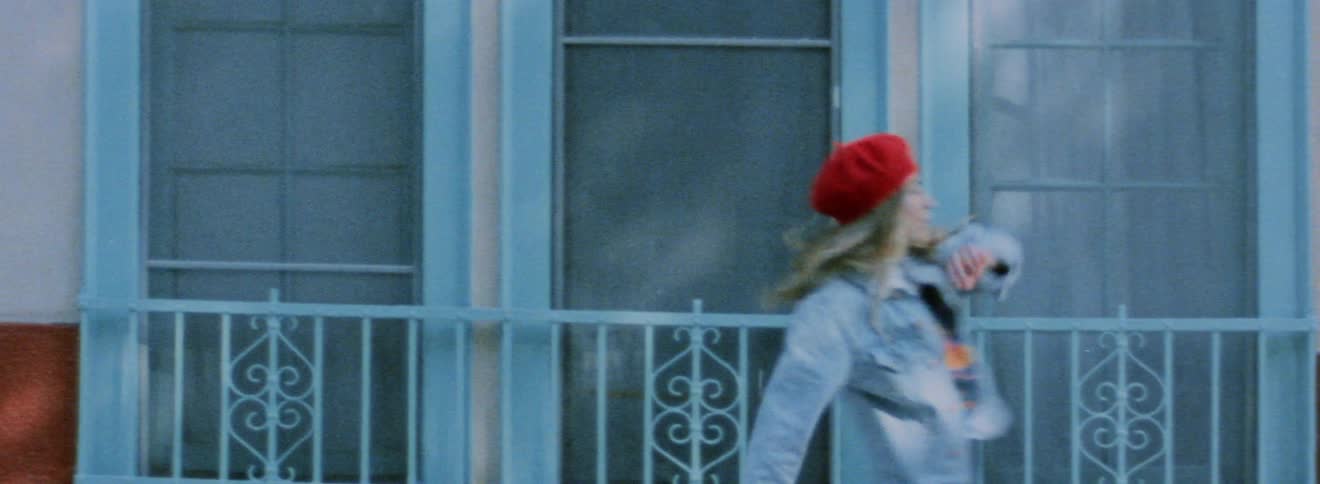 A view of a woman dancing while she walks