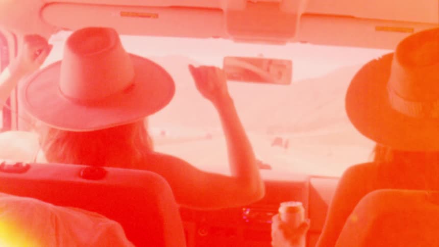 Females dancing in car