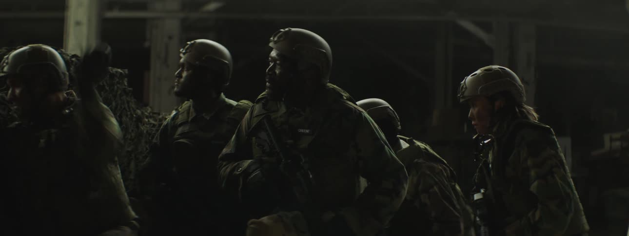Soldiers brace for an explosion