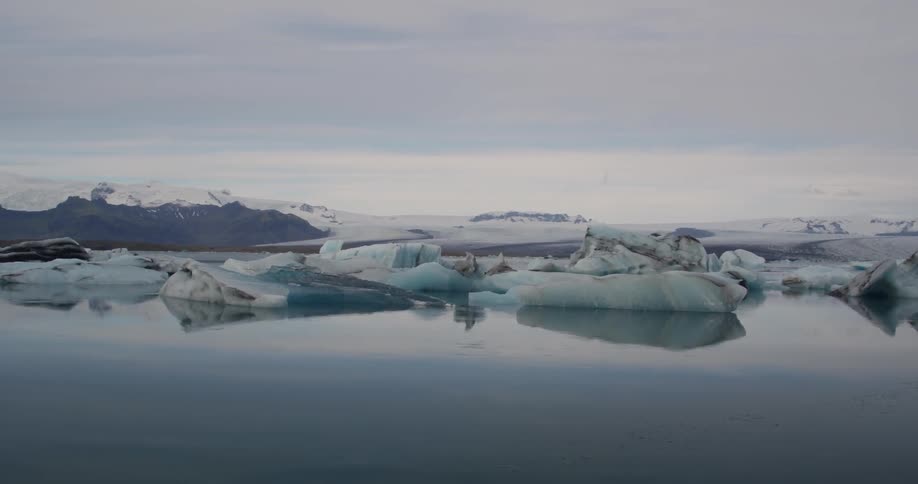 A row of ice sits near the shore
