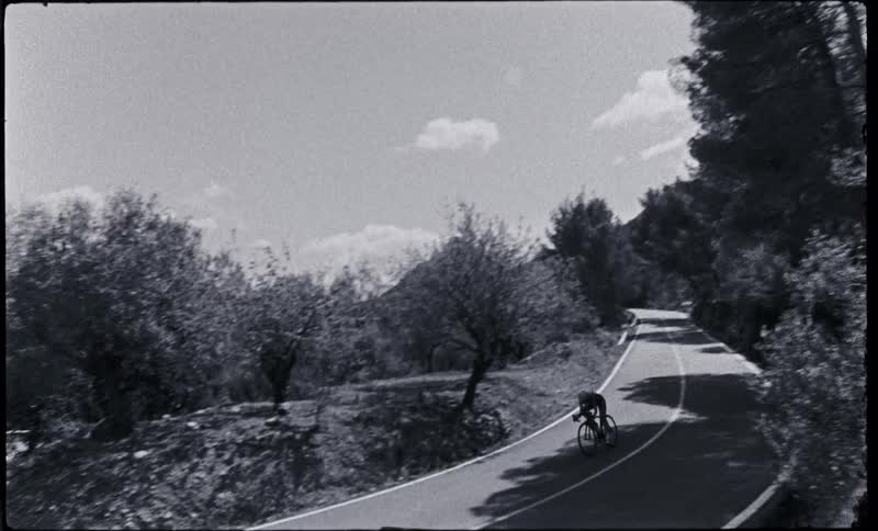 Person cycling on road