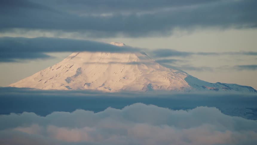 View from Commercial jetliner as it passes by Mount Adams on way to Portland Oregon