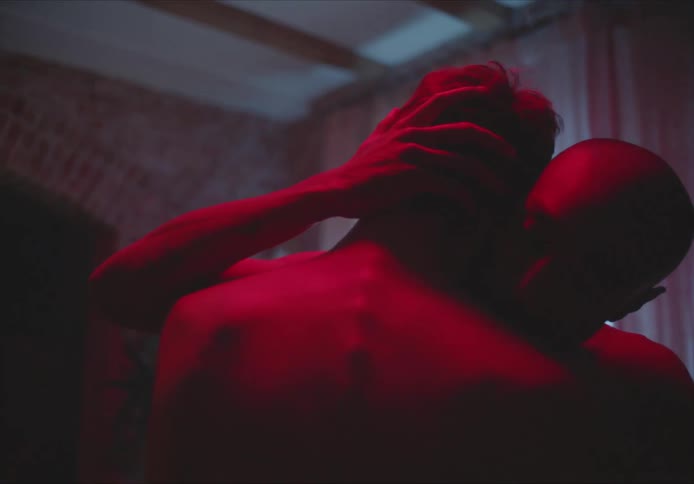 Two guys dancing indoors together