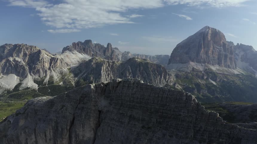 The mountain range is covered with green