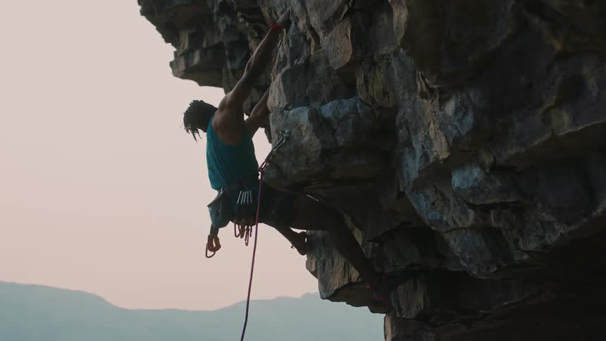 Person climbing rocks