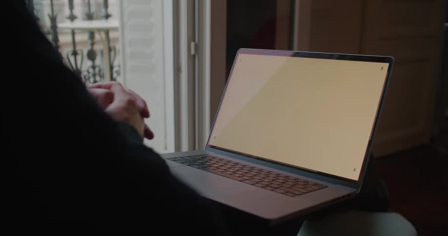 Blank laptop screen with tracking markers