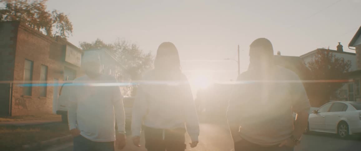 People walking down road