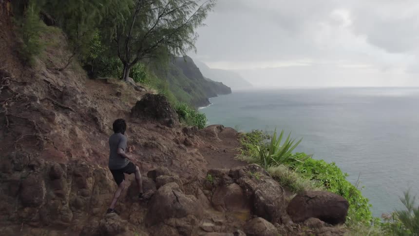 Person jogging on cliff