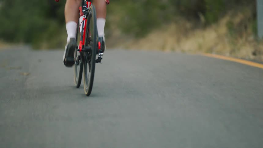 A man bikes along a ride