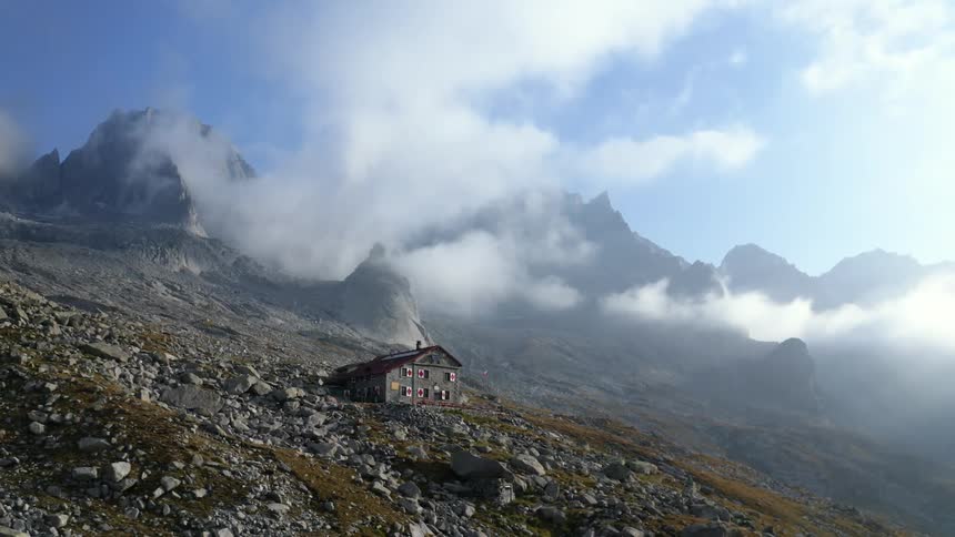 A house is near a mountain range