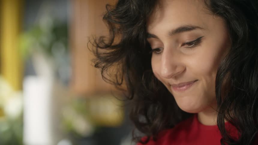 Young woman doing chores at home suddenly remembers something she forgot