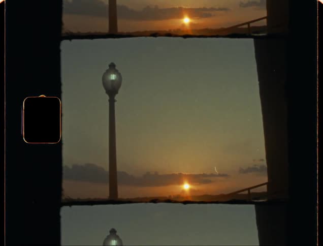 The sun is setting on the beach