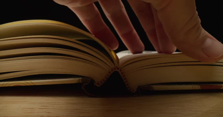 Someone is turning the pages of a book