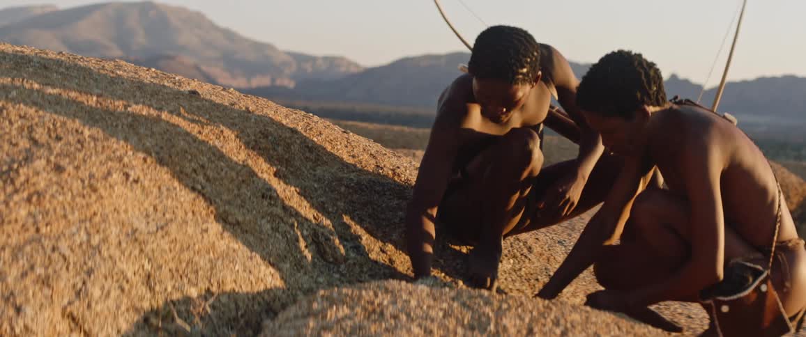Primitive men tracking prey