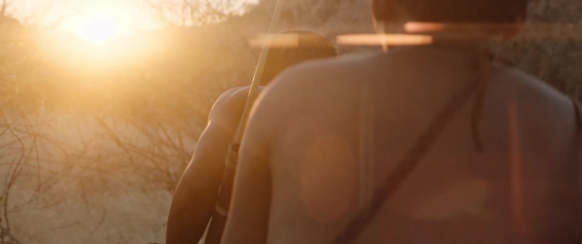 Tribal men at sunset