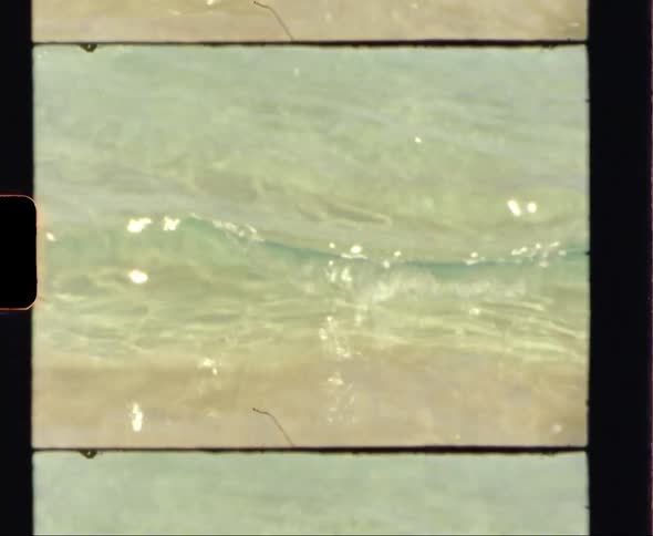 Footage of ocean waves is displayed