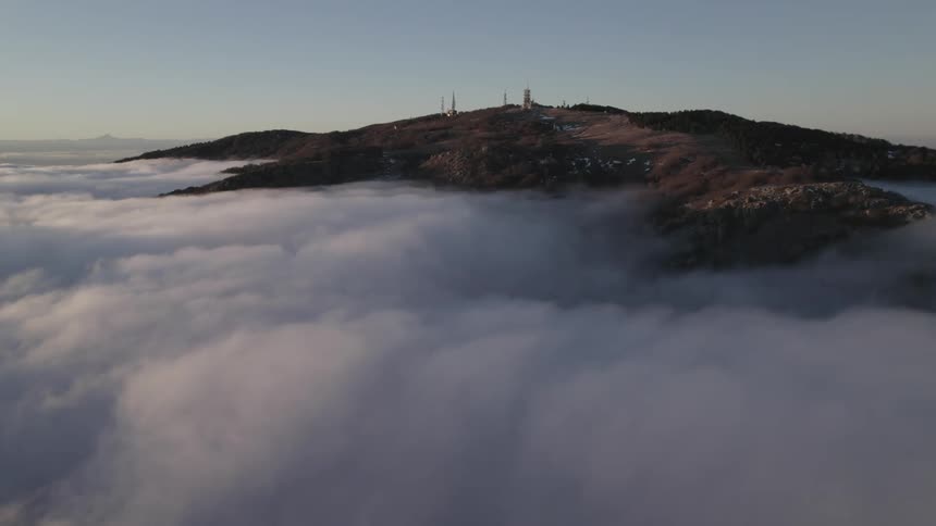 Clouds are covering the peaks of mountains