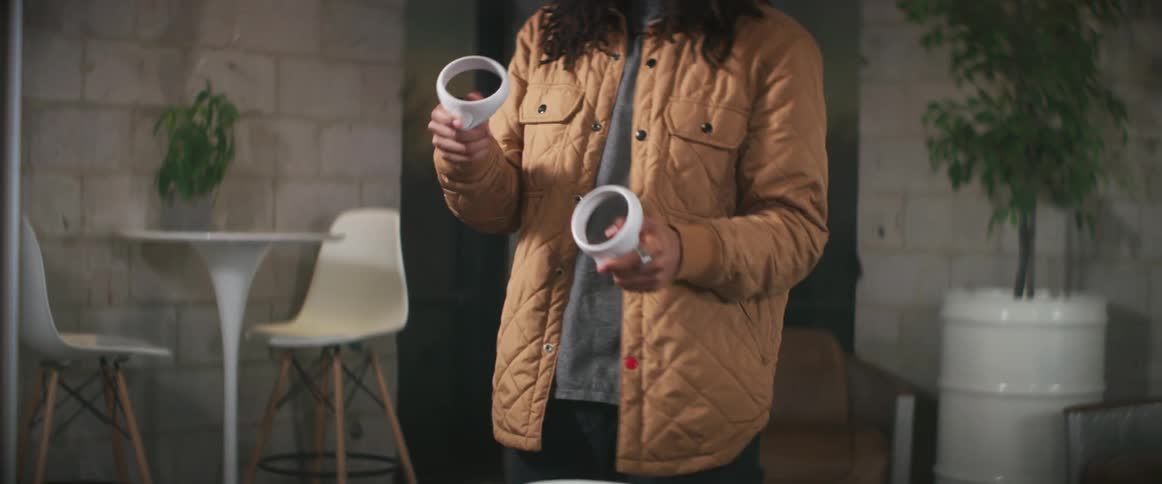 A view of a man playing virtual reality