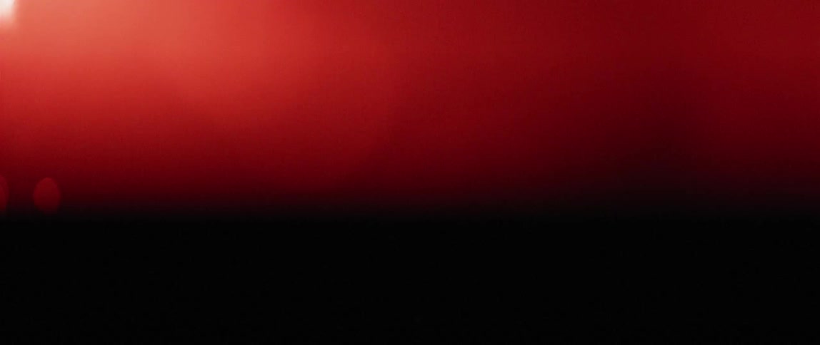 A dark area that blinks red blue and black