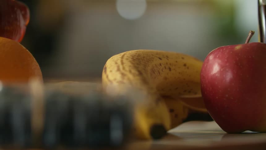 Assorted fresh fruits over the table at home