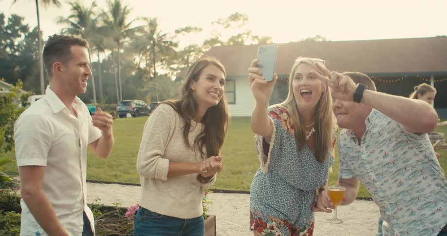 A group of people take a selfie together
