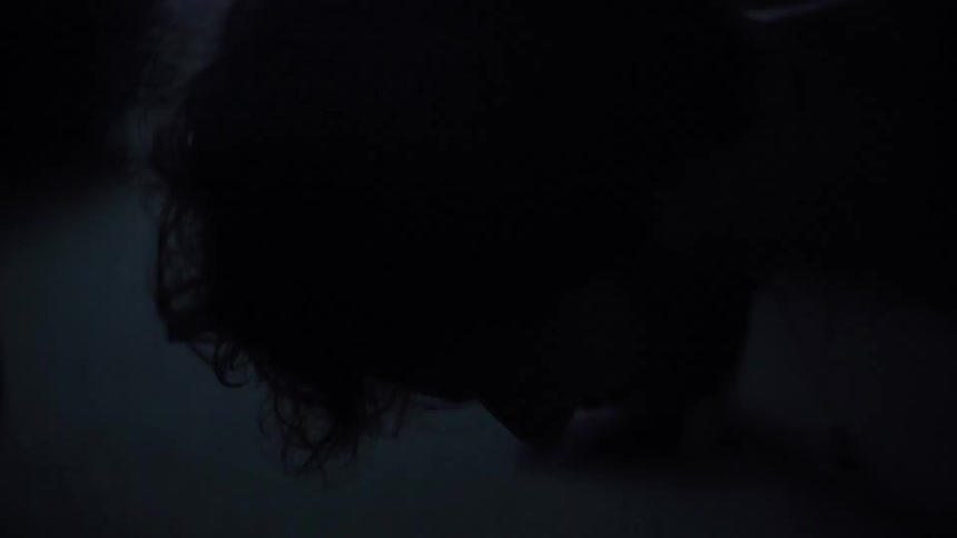 A man does push ups at home