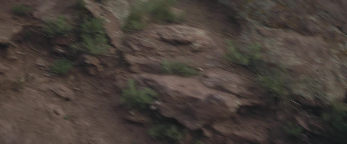 Rocks falling down a hill