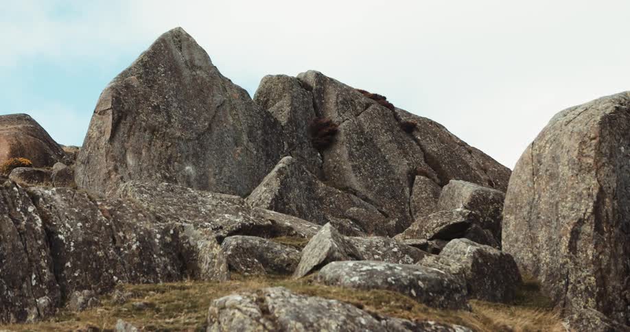 Large rock structures under a cloudy sky