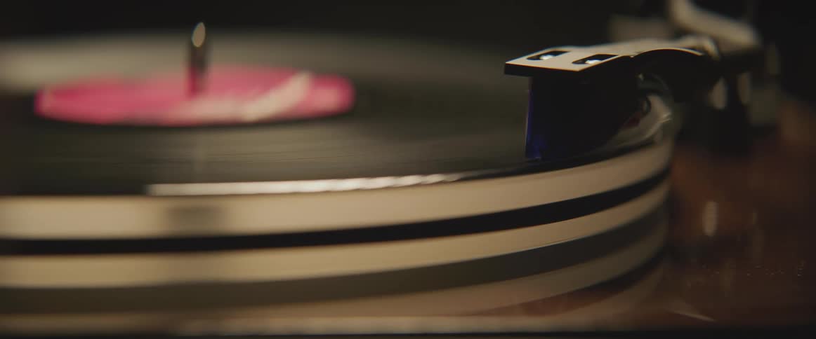 Vinyl records spinning at a record player