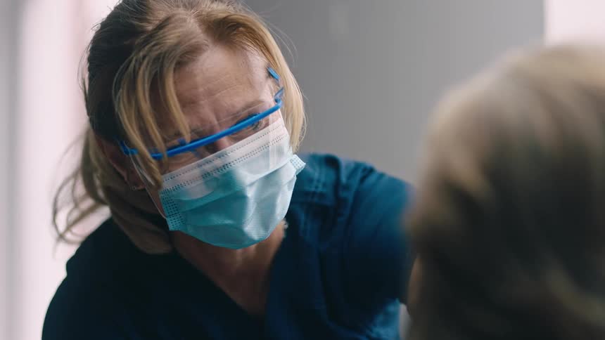 Nurse talking to patient
