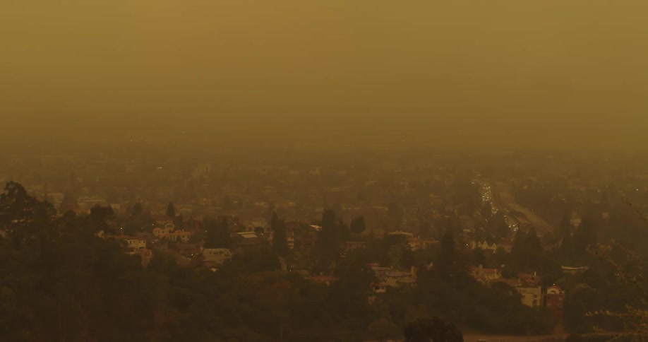 Dense smog settles over a city neighborhood