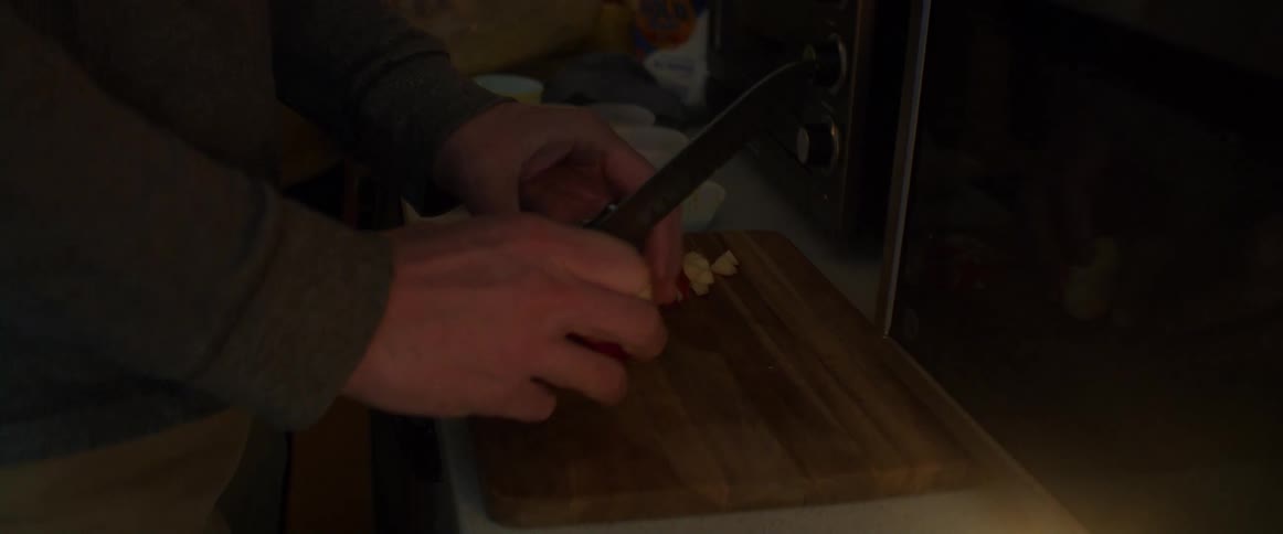 A person is cutting an apple