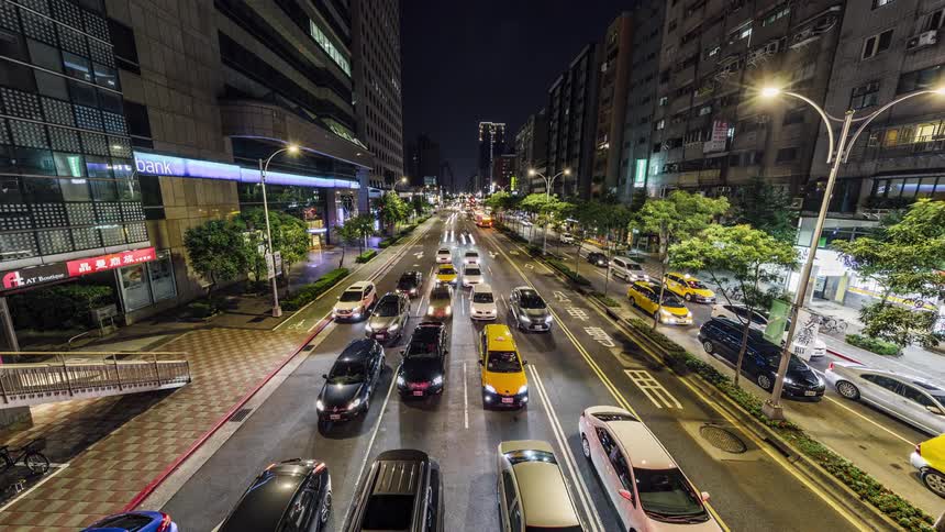 Time lapse view of traffic in a city is displayed