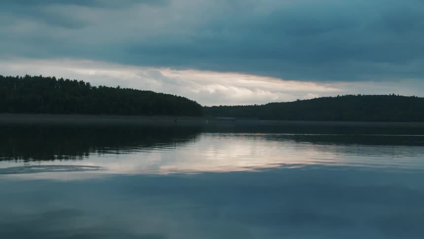 Water rippling on a lake on a cloudy morning