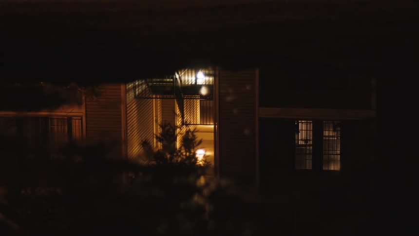 A building has its lights on at night