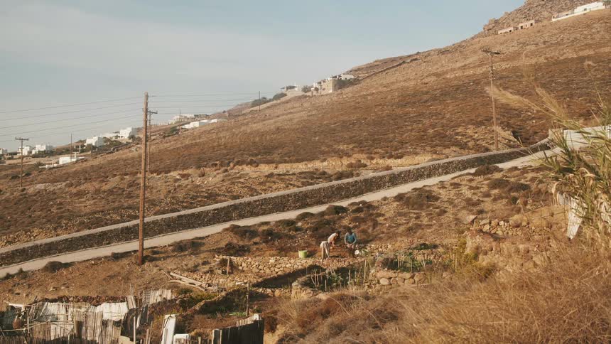 A view of hills with some power lines on them