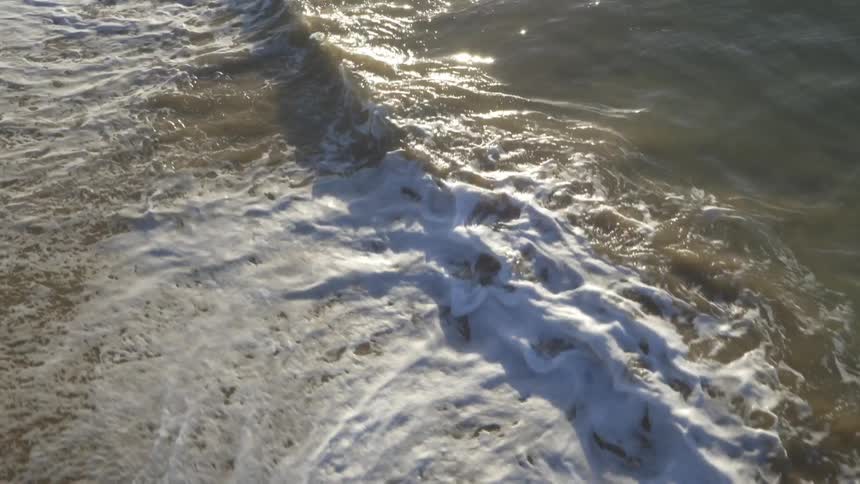 Waves wash onto the beach